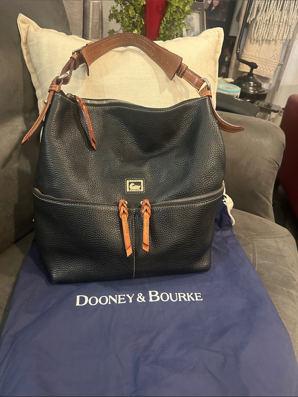 Dooney & Bourke Black Leather Hobo with Brown Trim